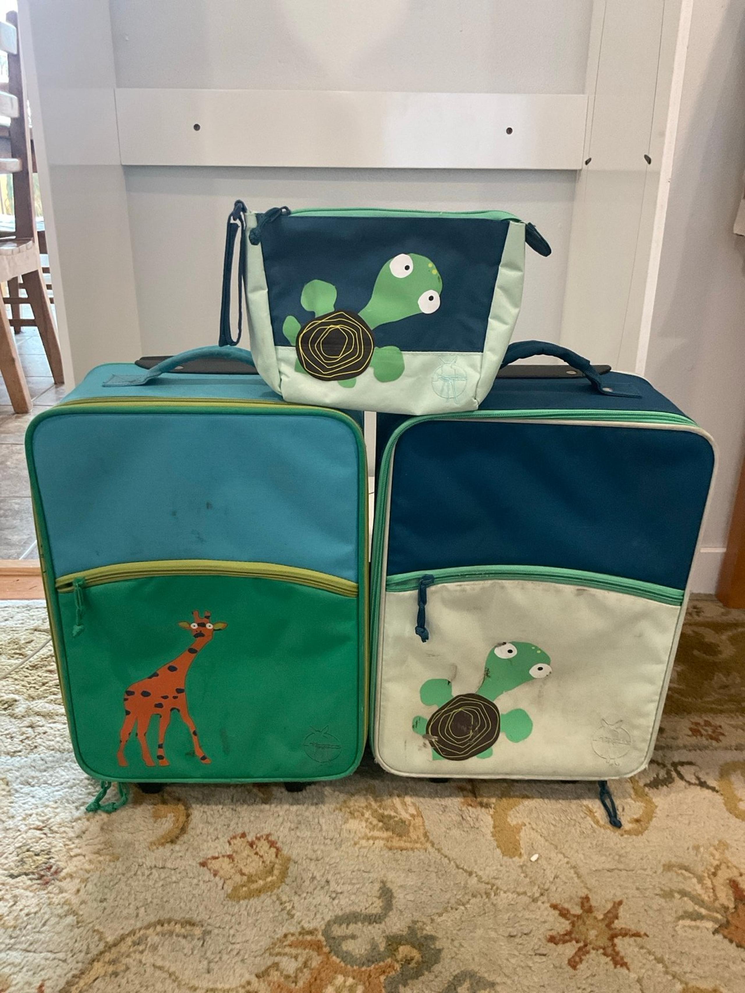 Bundle of kids suitcases