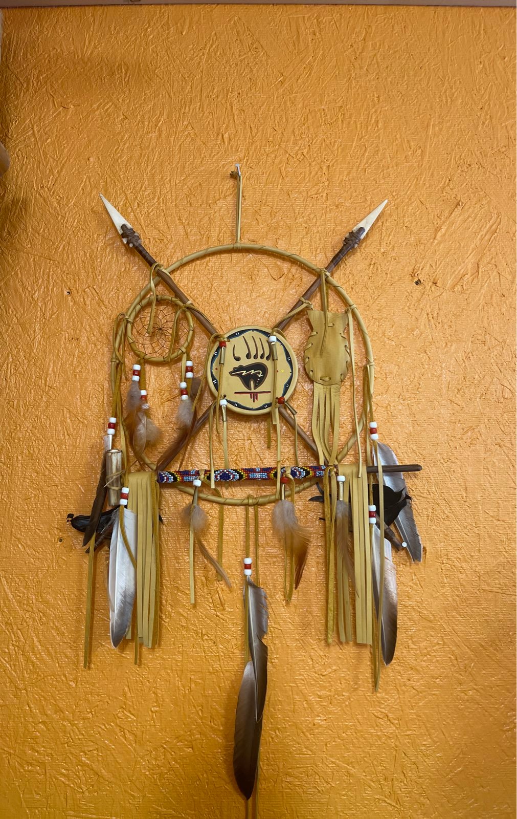Native shield. With medicine pouch, dream catcher, elk bone arrowheads. Hand bea