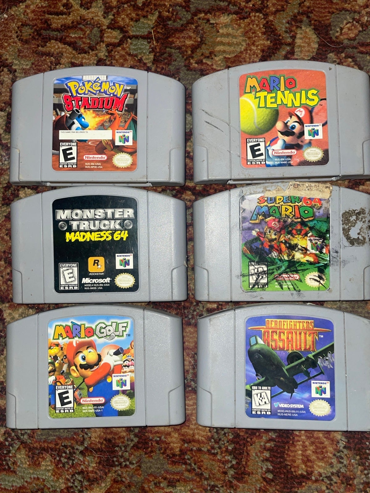 n64 console box and 6 games