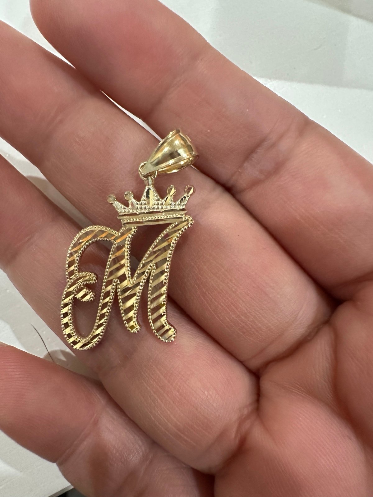 10kt yellow gold M pendant with crown