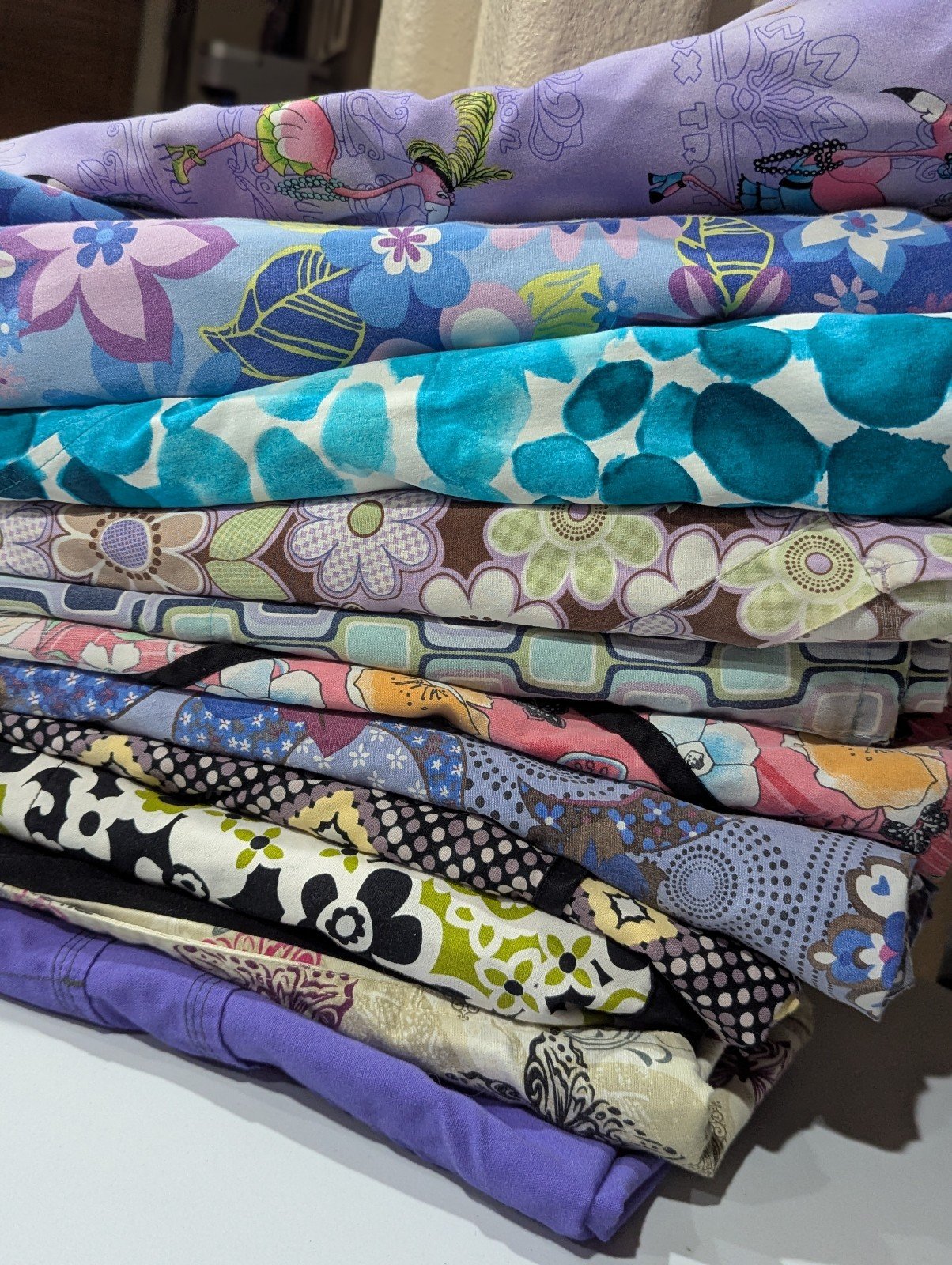11 piece Scrub Top Bundle Size 3X all print and one solid