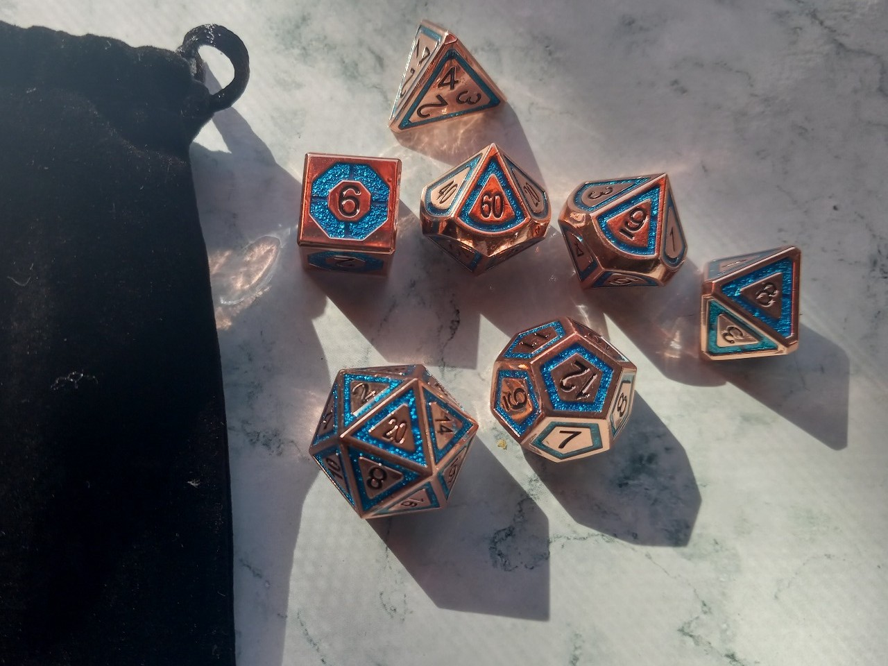Metal dice with blue inlay set