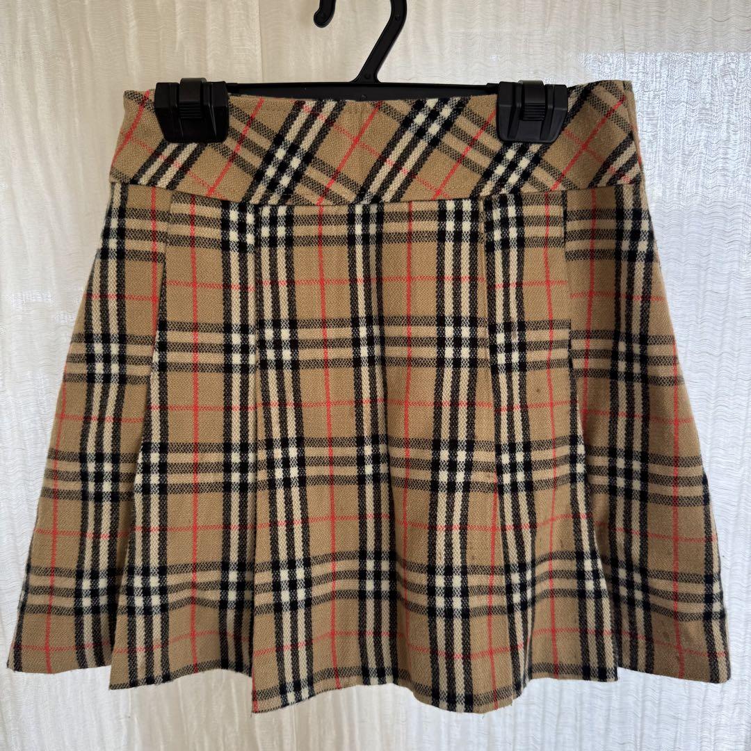 Burberry's check pleated skirt, size 25.