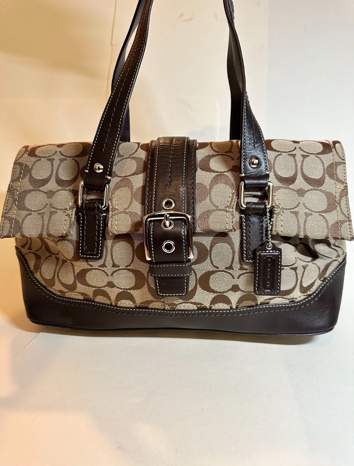 Coach Hampton’s signature flap Handbag