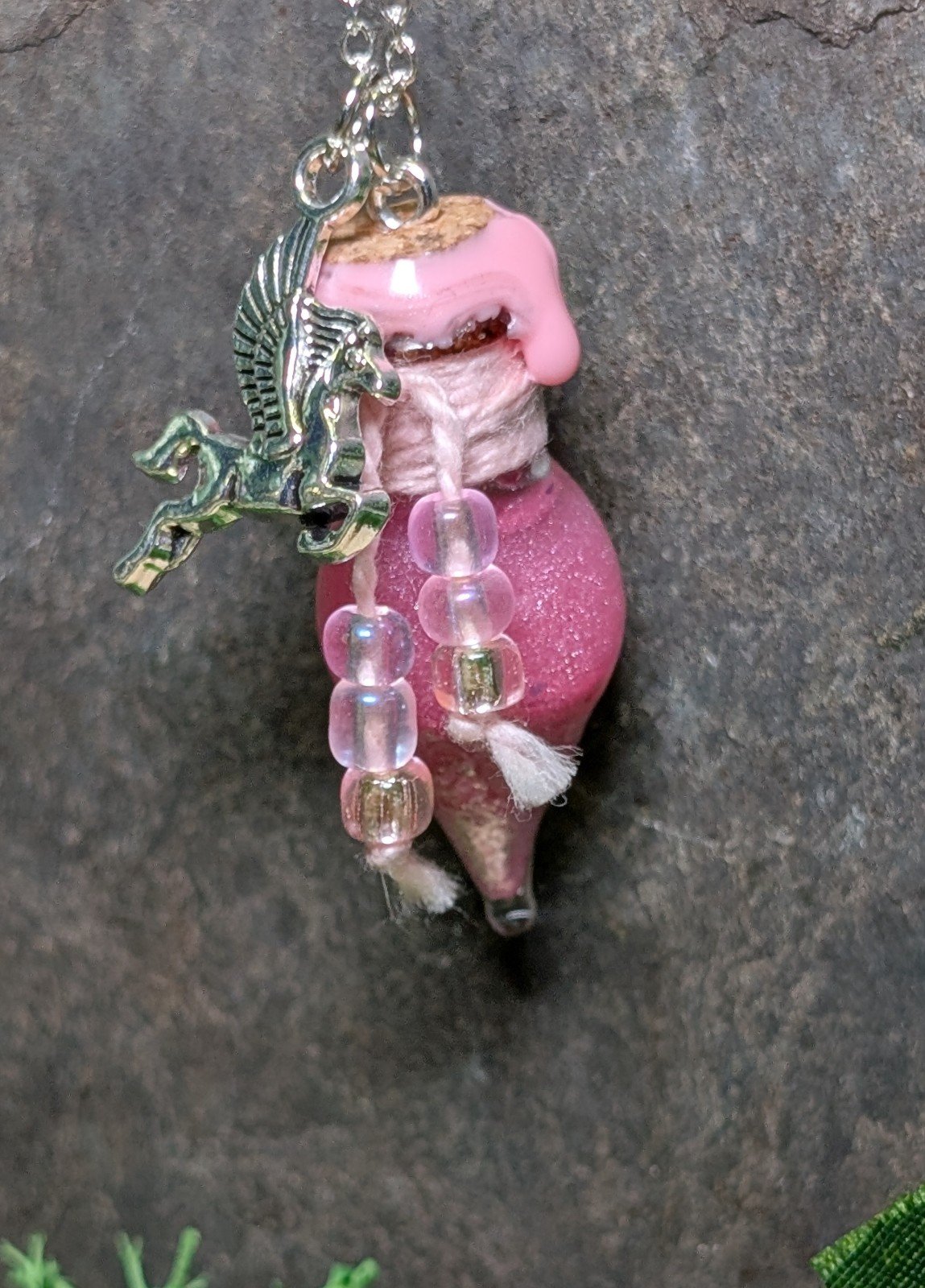 Pegasus Tears Potion with Pegasus charm on necklace chain. Really pretty