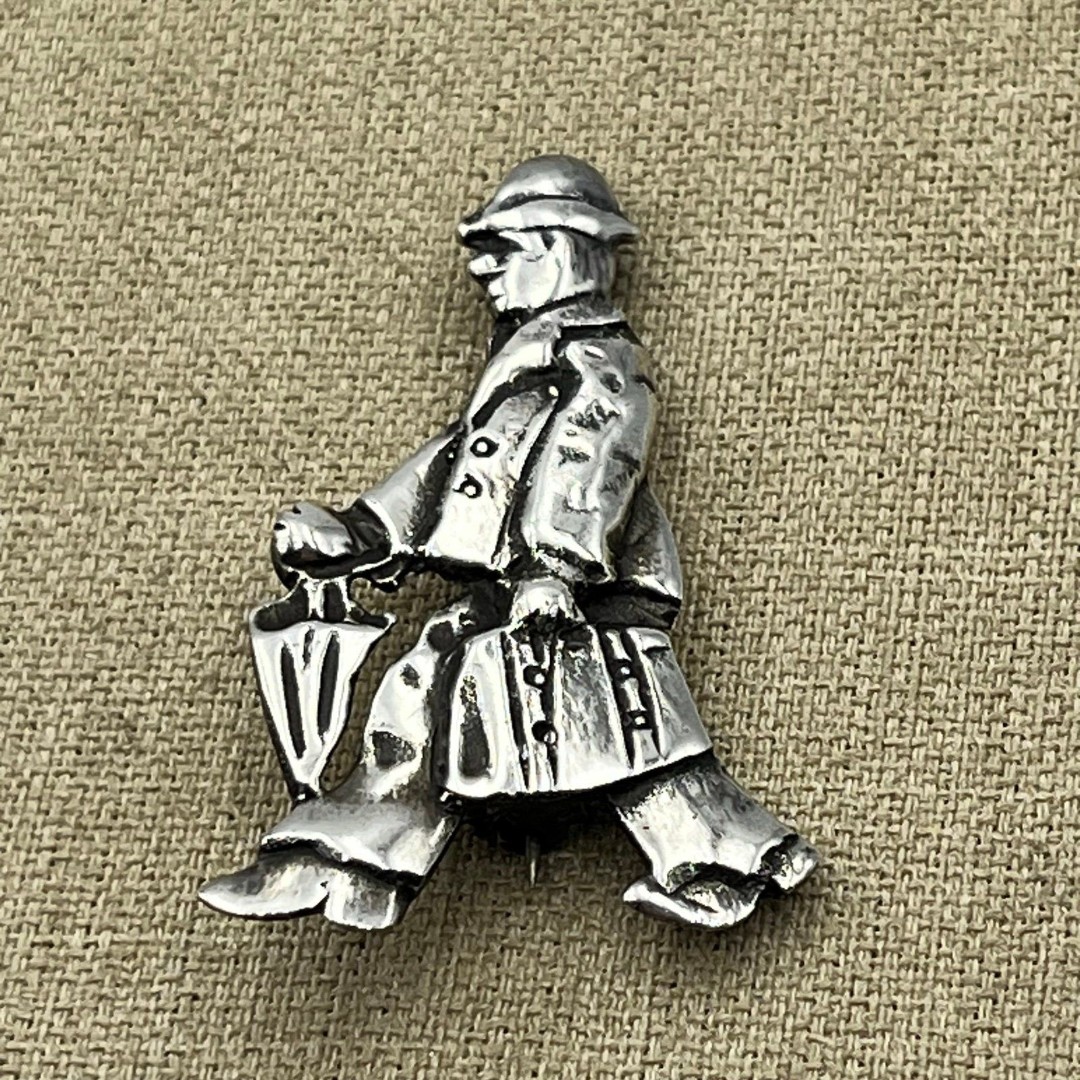 Vintage sterling silver man with umbrella pin brooch