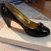 Black and Gold Coach Heels