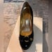 Black and Gold Coach Heels