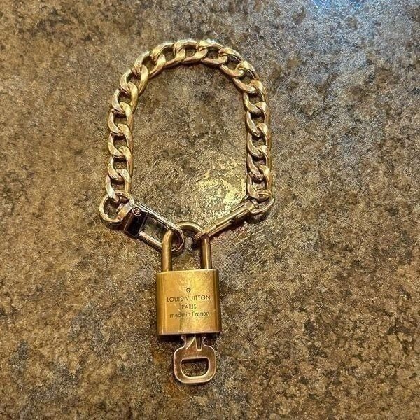 Louis Vuitton #343 Lock and Key Gold Brass with new unbranded chain