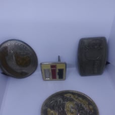 belt buckles four different ones