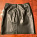 Black leather mini skirt