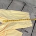 HAMPTON TUCK FRONT PANT IN SOFT YELLOW SZ S.