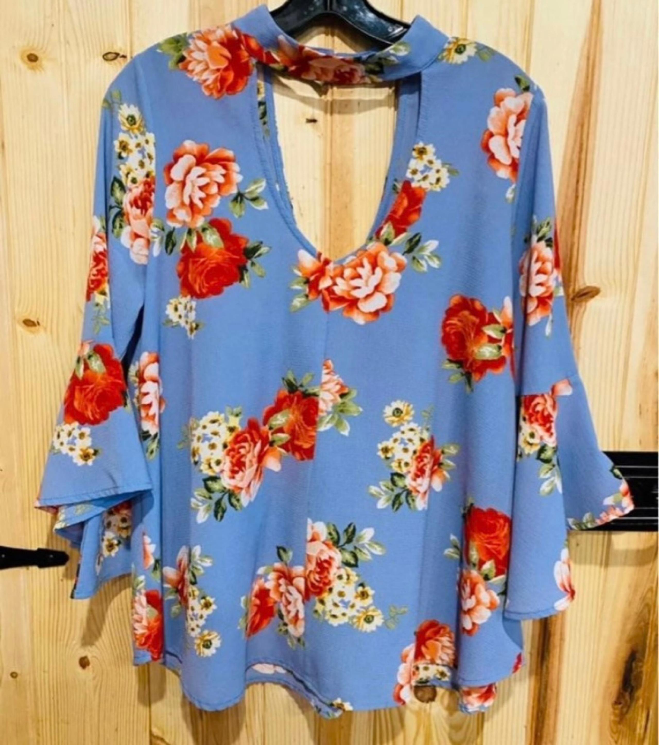 Peppermint floral blouse with ruffle sleeves