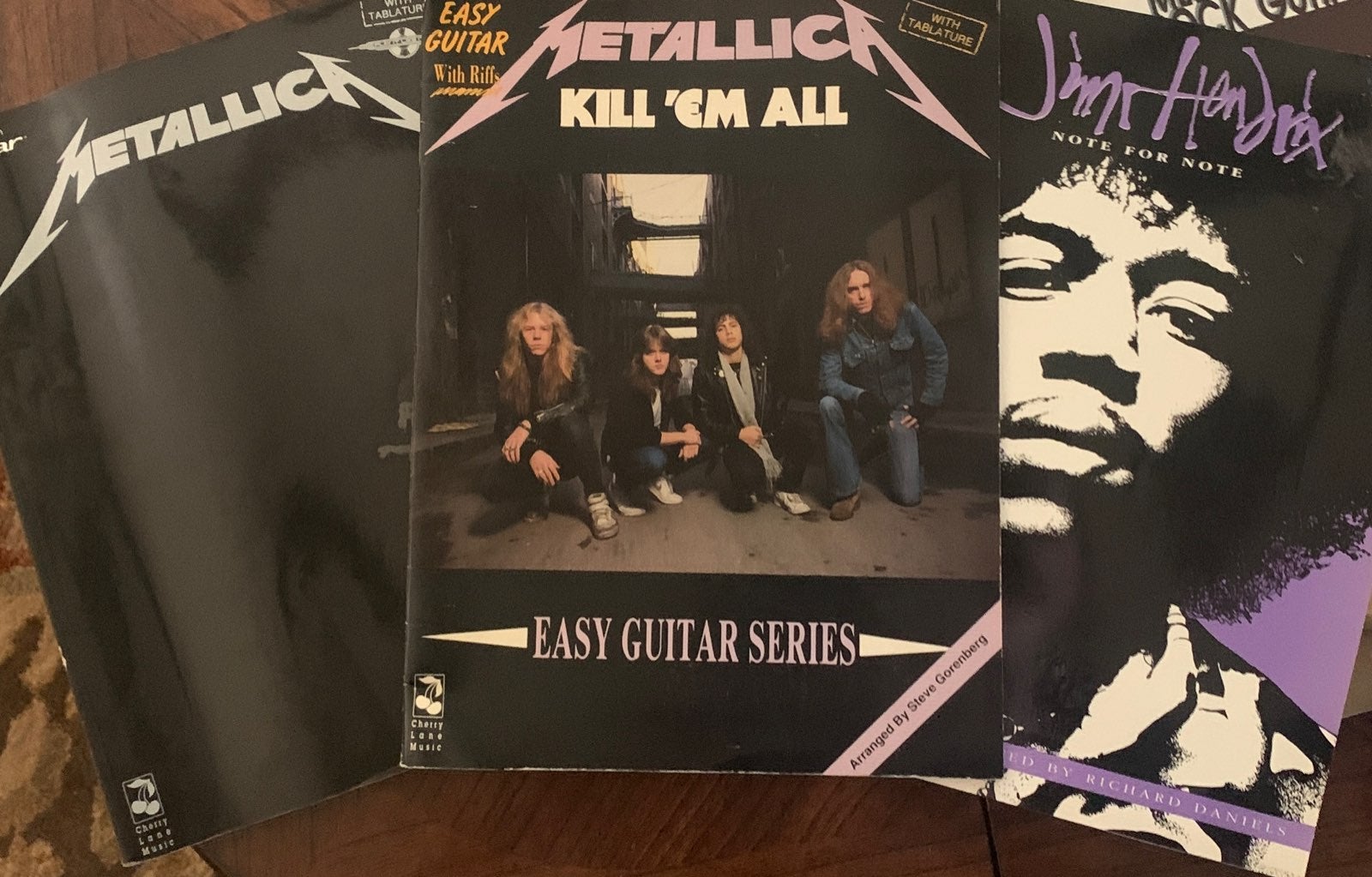 7 guitar books and 1 picture book