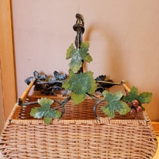 Wicker and Metal Basket Grapes Leaves