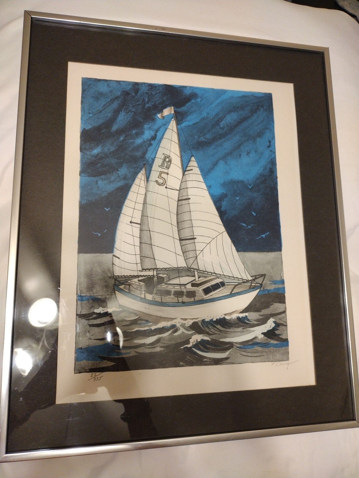 Framed sailboat with certificate of authenticity