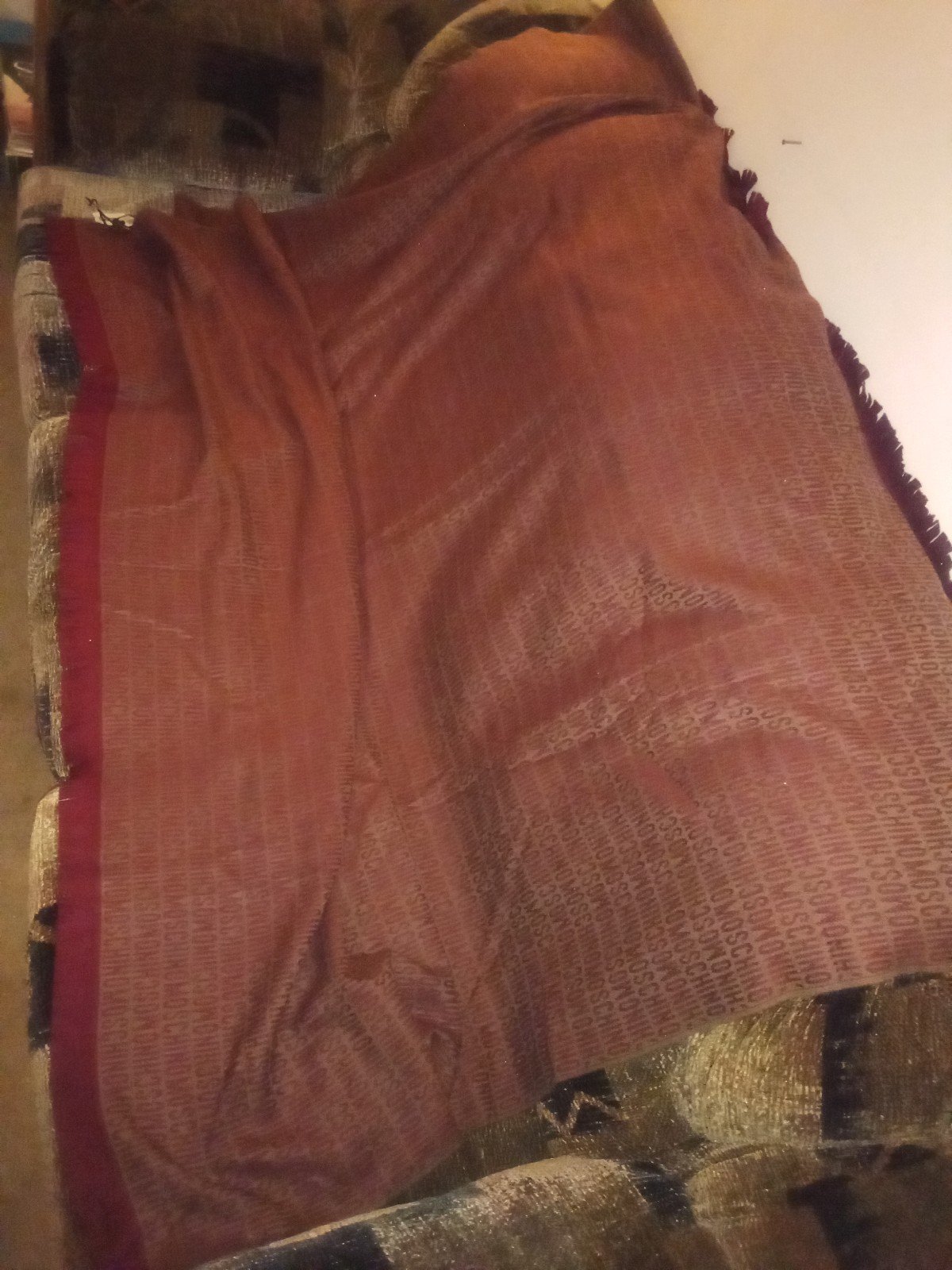 Gorgeous Moschino NWT 60 In x 70 In red blanket.