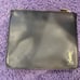 YSL pouch and lipstick