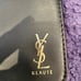YSL pouch and lipstick