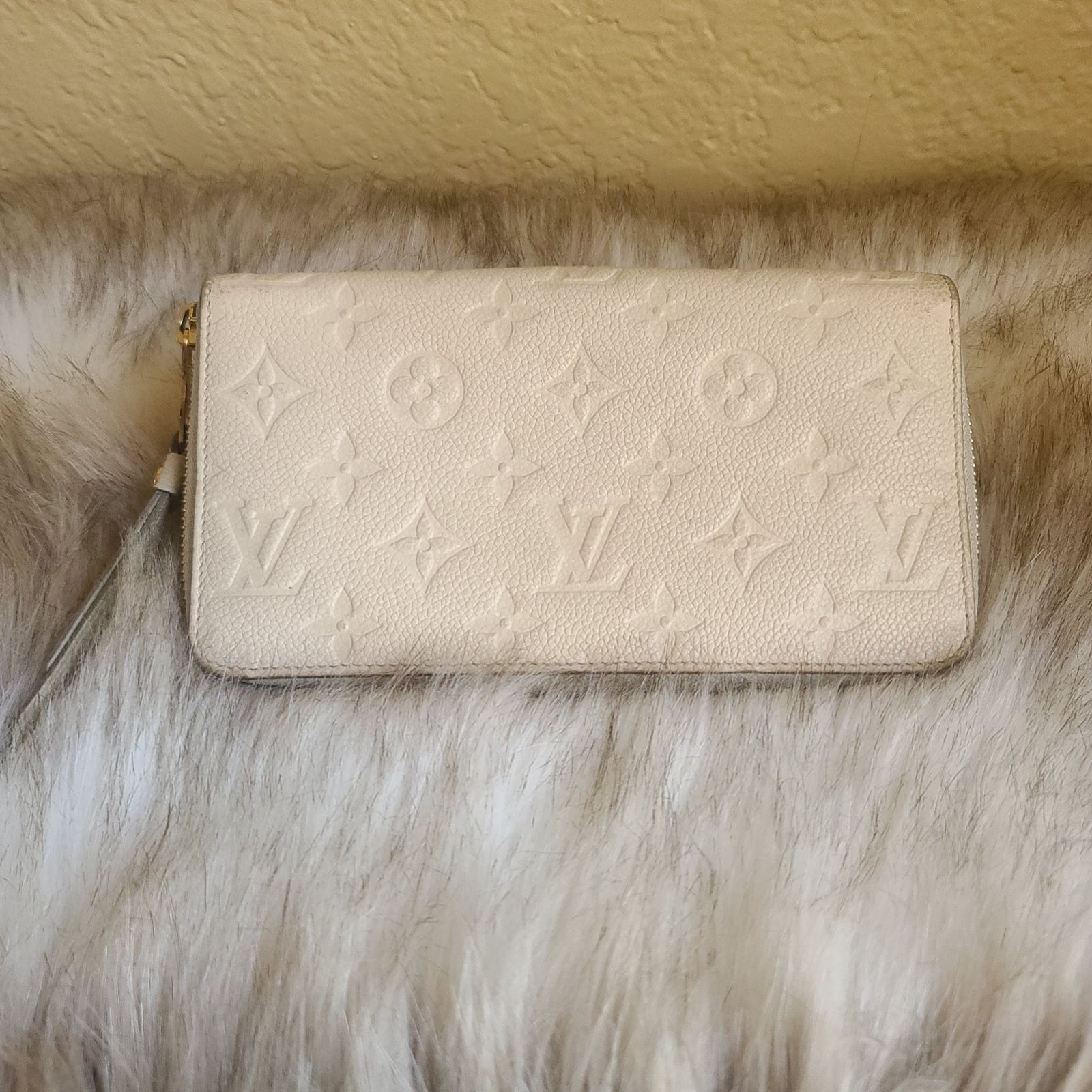 Louis Vuitton empreinte zippy wallet