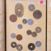 Large assortment of Japanese coins in nice frame