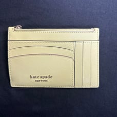Kate Spade coin case / card holder in yellow.