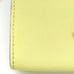 Kate Spade coin case / card holder in yellow.