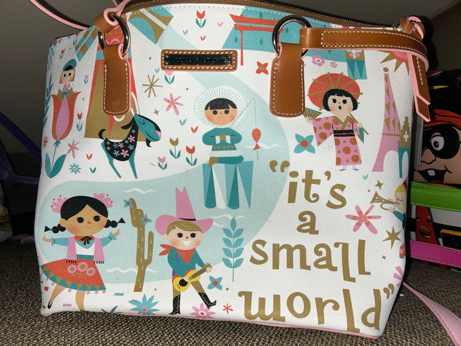 Dooney and Bourke It’s a small world purse