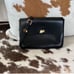 Donatienne black waist bag/clutch