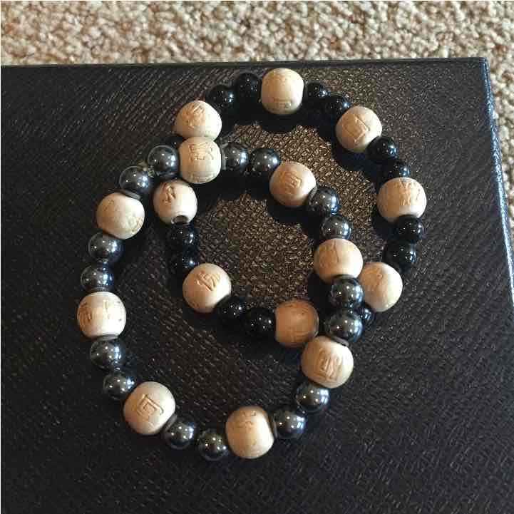 Wood and rosary bead bracelets