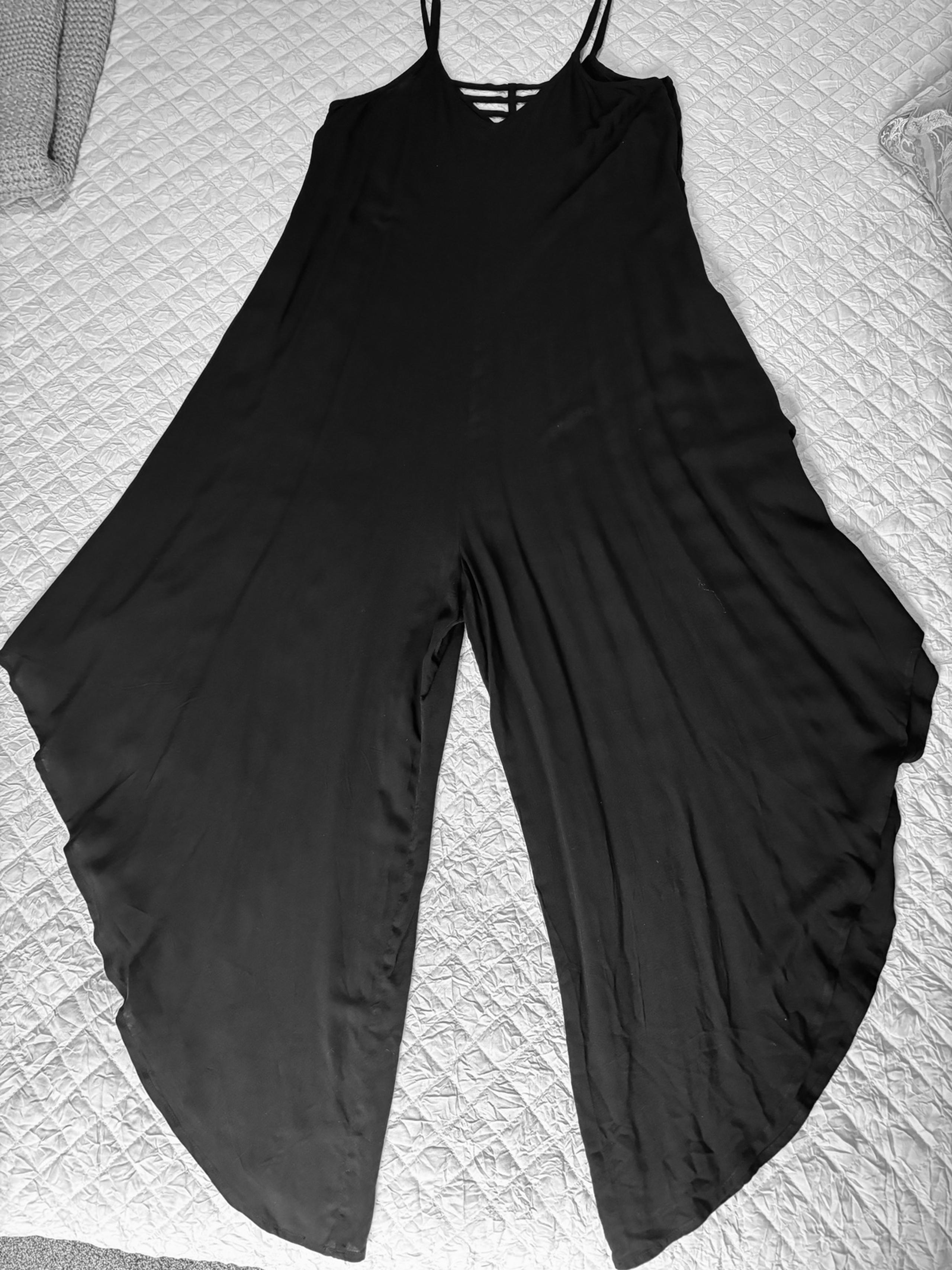 Black flowy jumpsuit/romper with side zipper