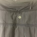Lululemon skirt run pace setter black skirt size 8 *fading on logo + throughout