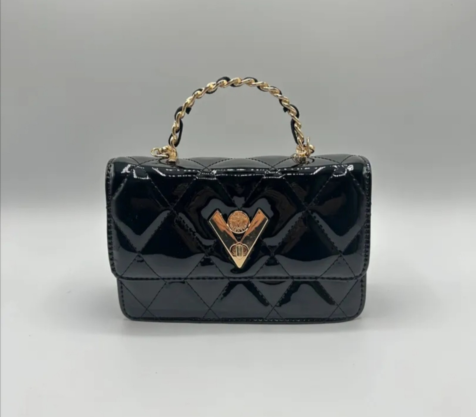 NWT Valentino Orlandi Quilted Crossbody Handbag with V lock and trolley pocket.