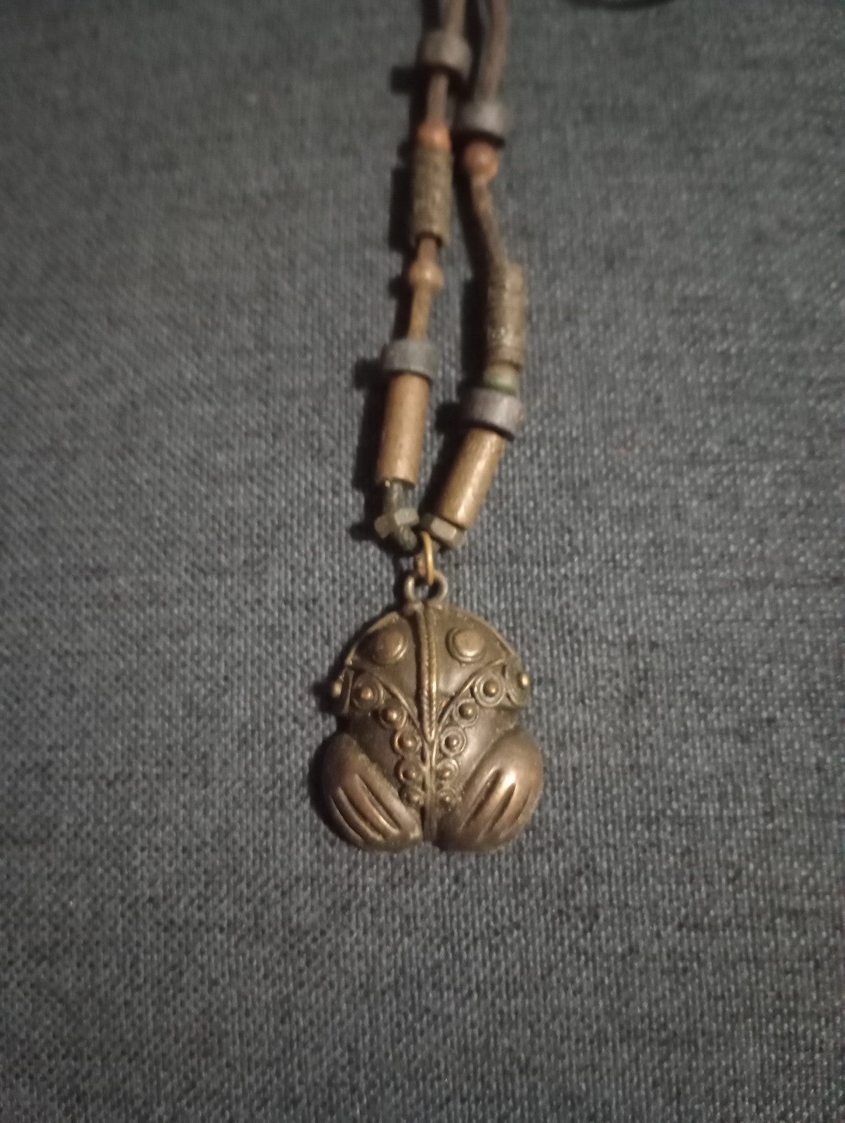 THIS IS COOL PRE 1492 FROG NECKLACE NOT SURE WHAT IT MADE OUT OF