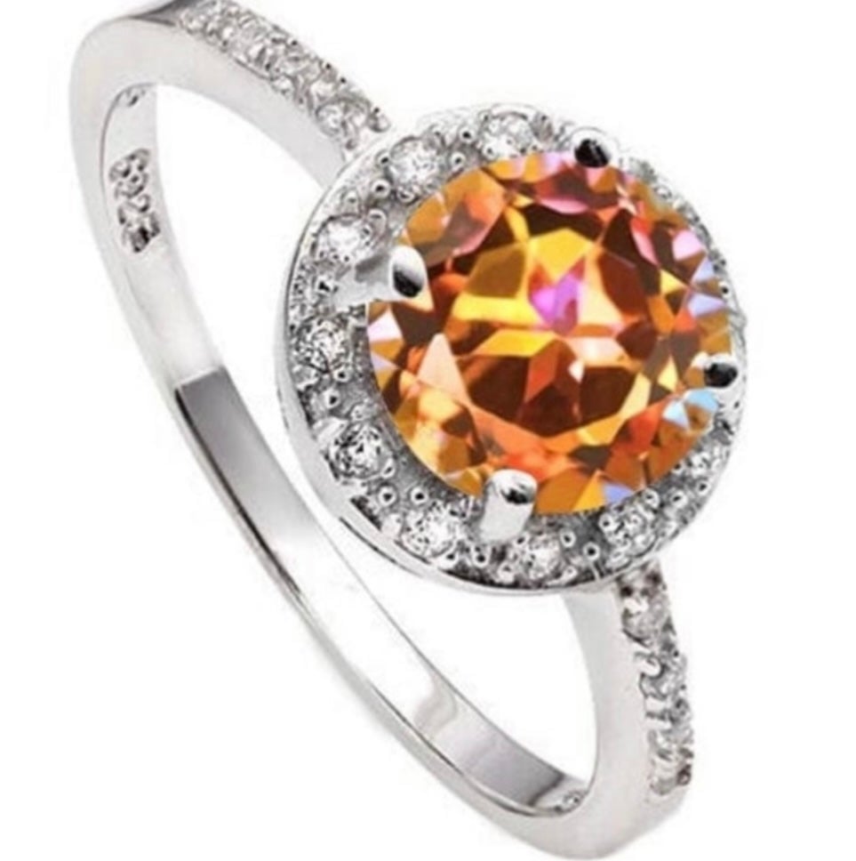 14K white gold Azotic gemstone and diamond ring.