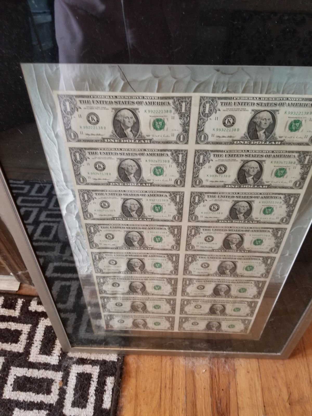 Uncirculated dollar Bill's, professionally framed.