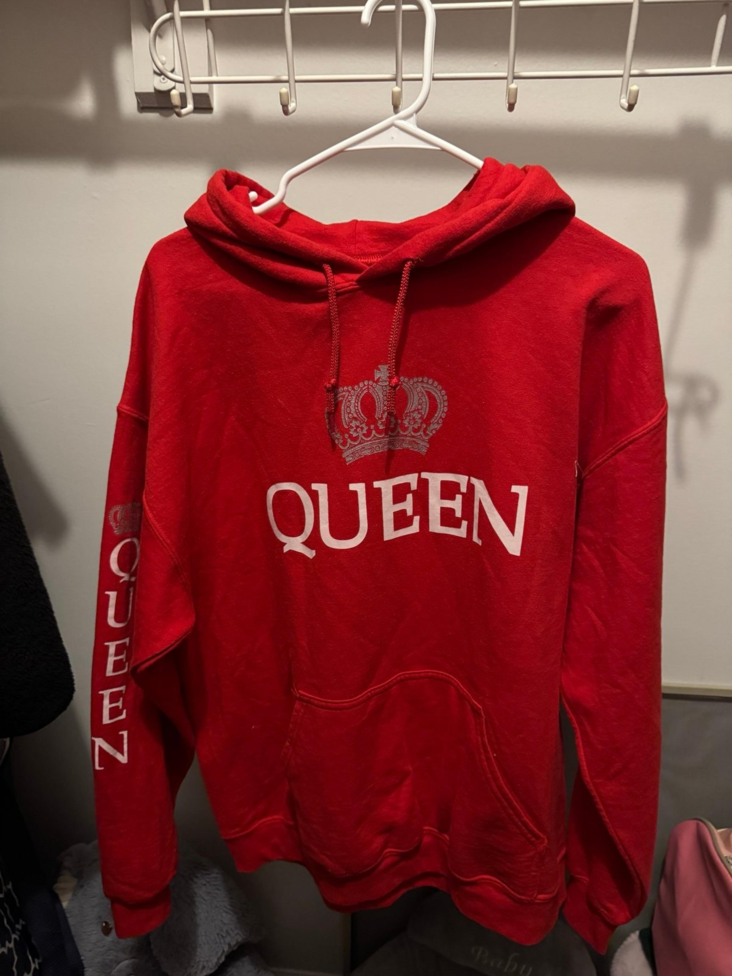 Red hoodie says Queen large