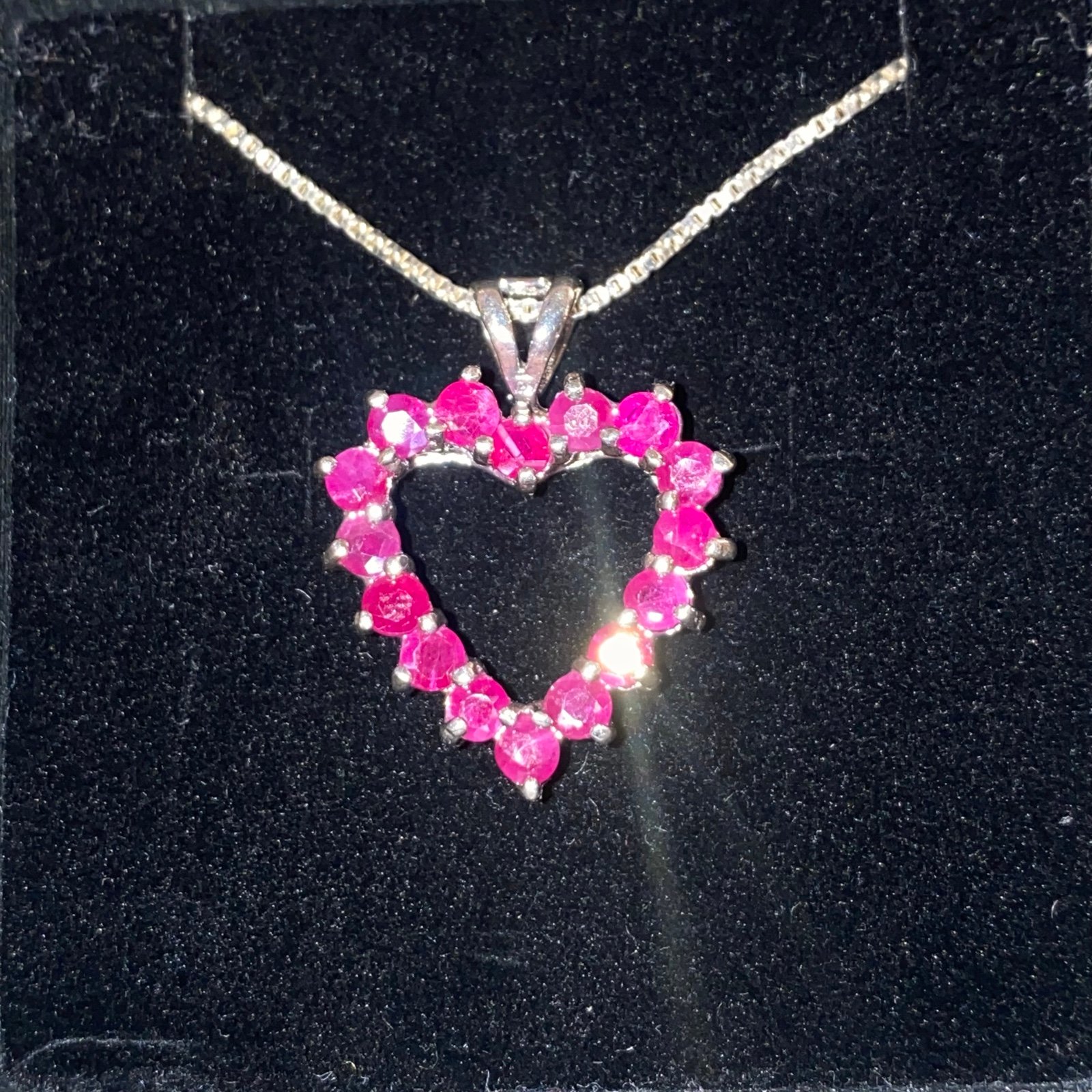 Sterling silver heart necklace with rubies (I’m pretty sure their ruby)