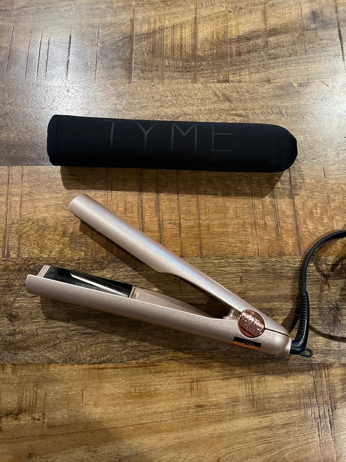 TYME Iron Pro curling & straightening iron. Rose gold color.