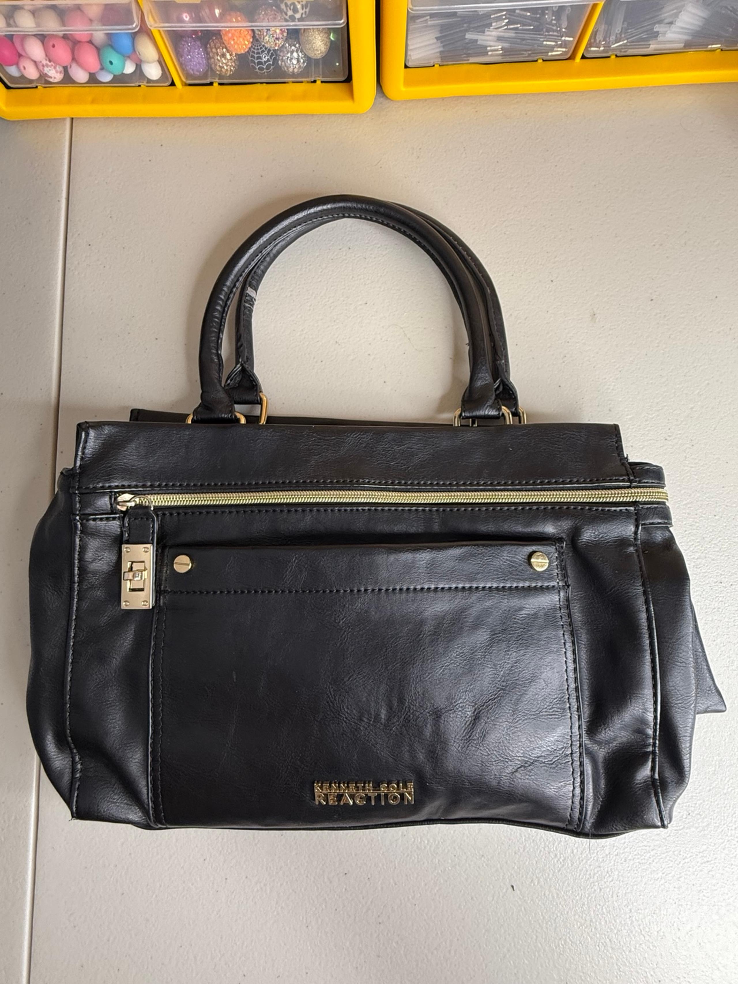 Black leather Kenneth Cole Reaction shoulder bag with gold hardware