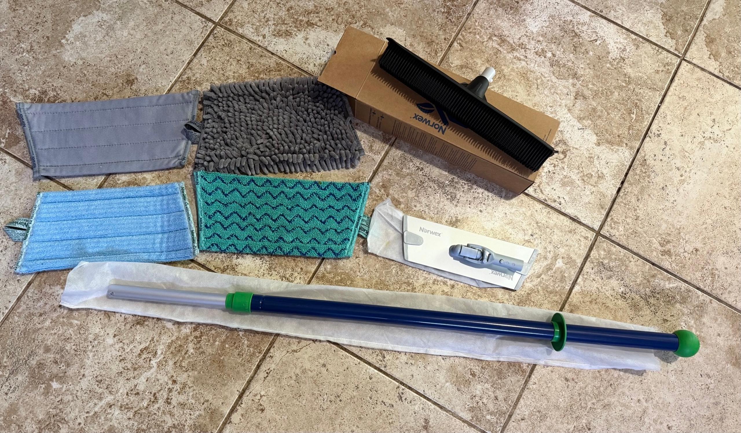 Norwex  mop system  with 4 mop pads , mop and rubber brush broom