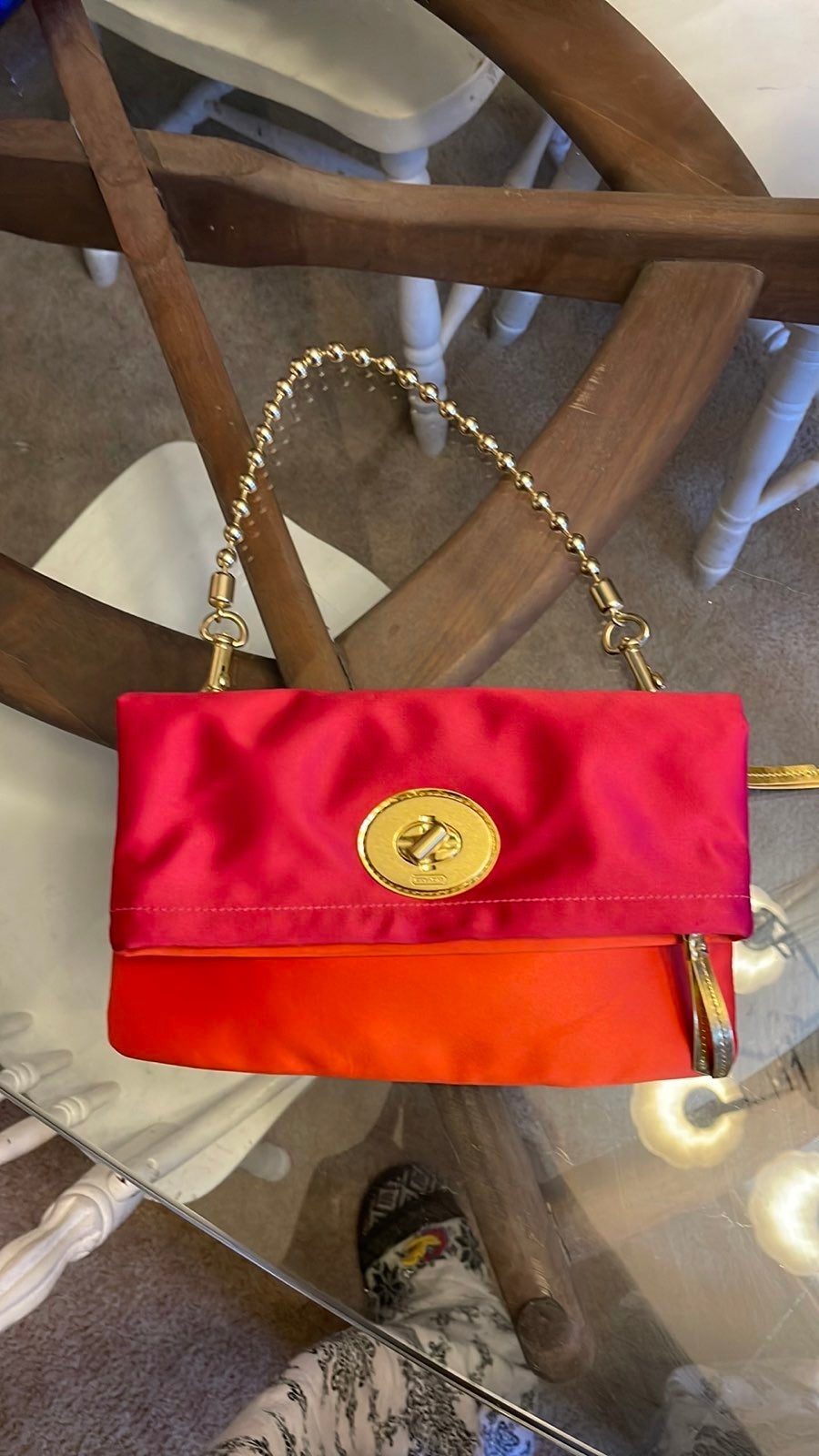 Pink and orange Coach purse