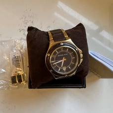 Michael kors watch. Gold and chocolate brown.