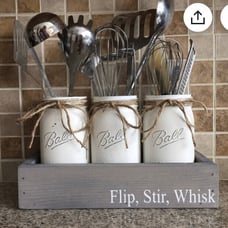 Chalk painted distressed mason jar utensil holders.