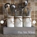 Chalk painted distressed mason jar utensil holders.