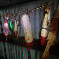 Fishing poles lures full tackle box.
