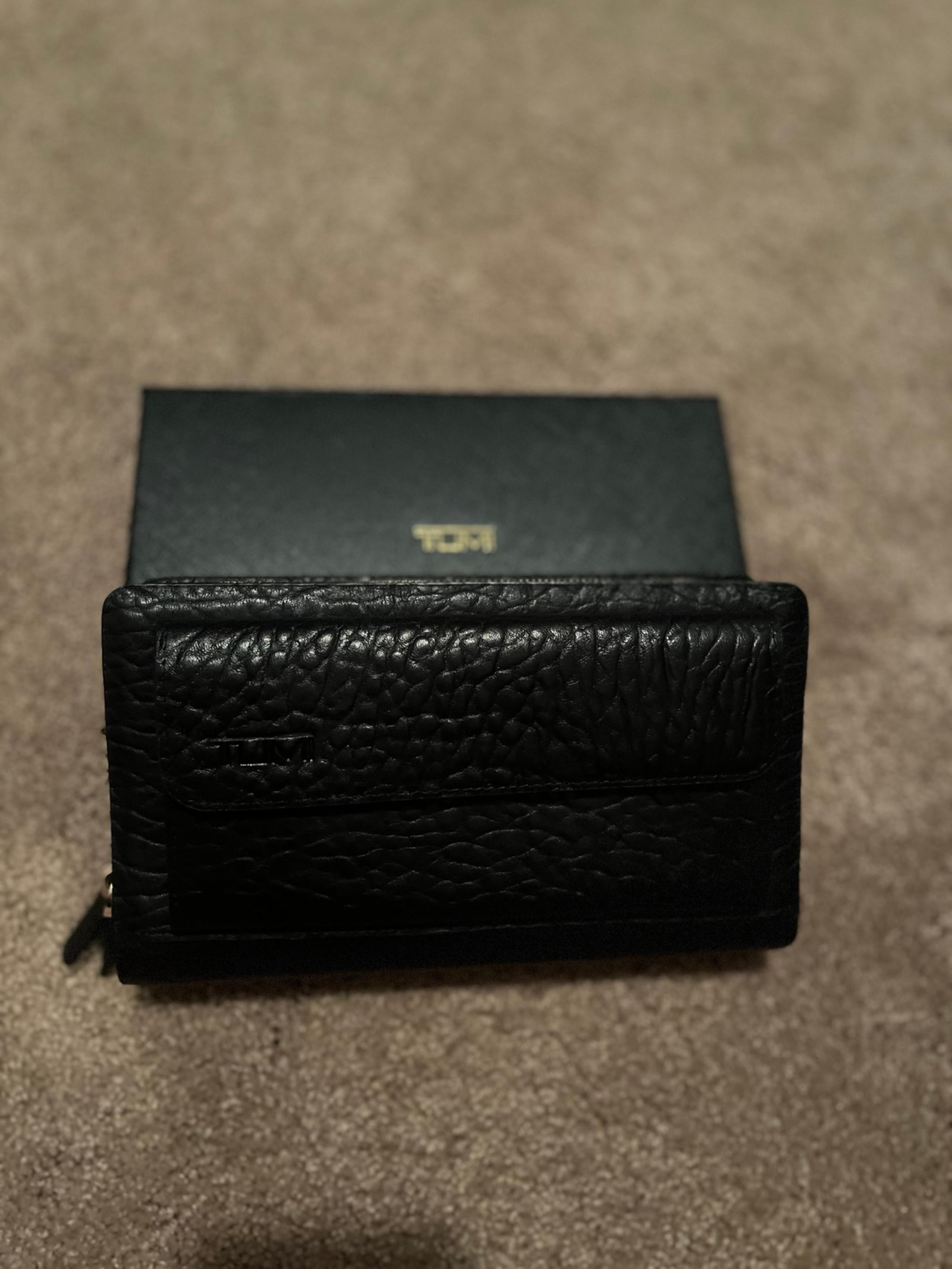 Brand New Designer Tumi Travel Wallet, Wristlet. Black Leather. Box and Dust Bag