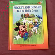 Mickey and Donald in the tickle grass