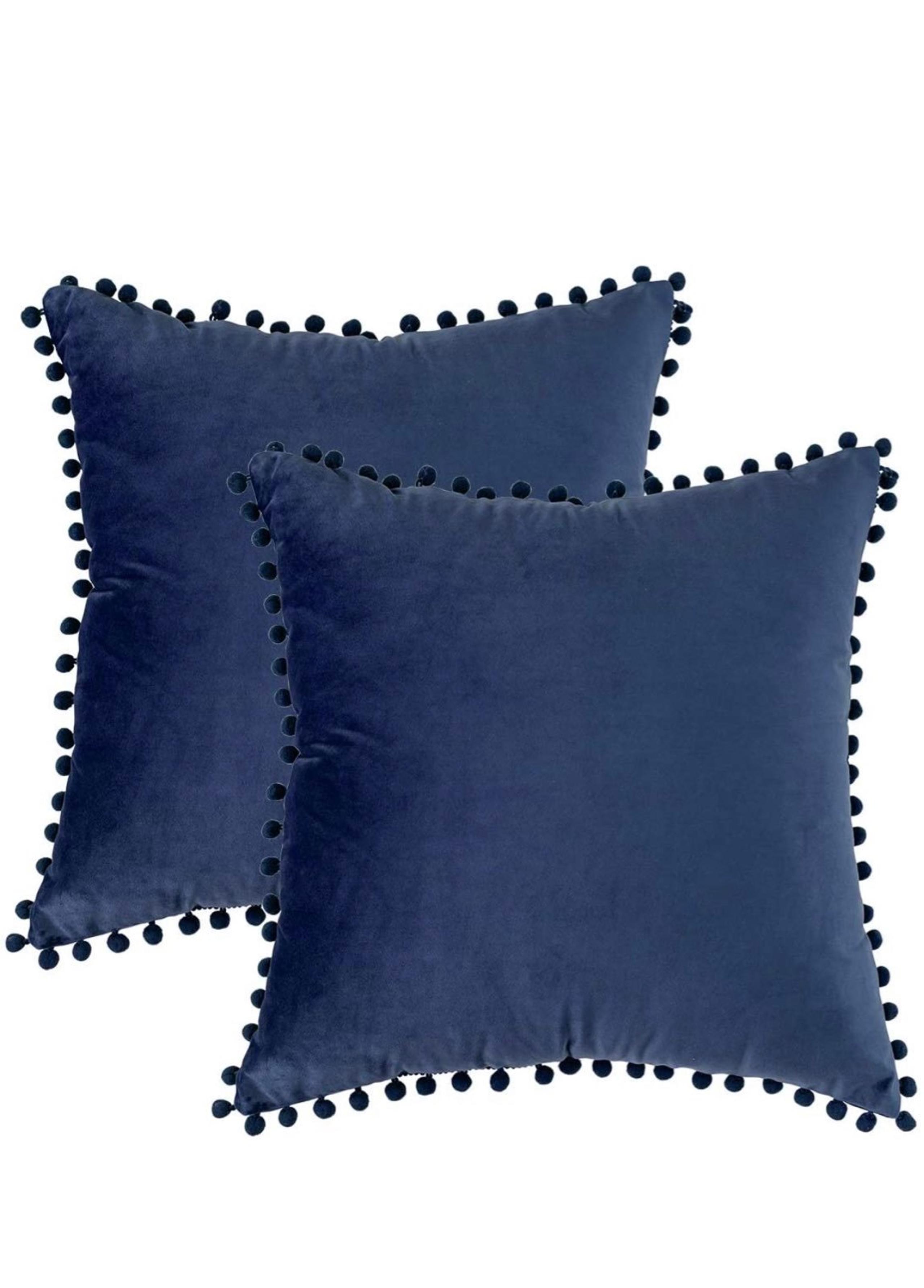 Two navy blue pillow covers