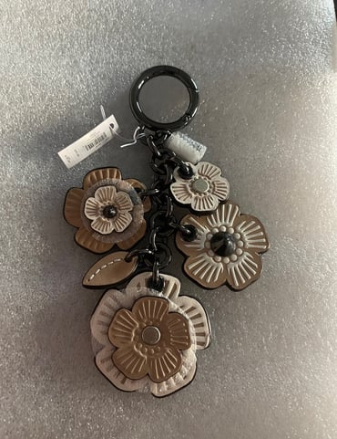 Coach tea rose bag charm